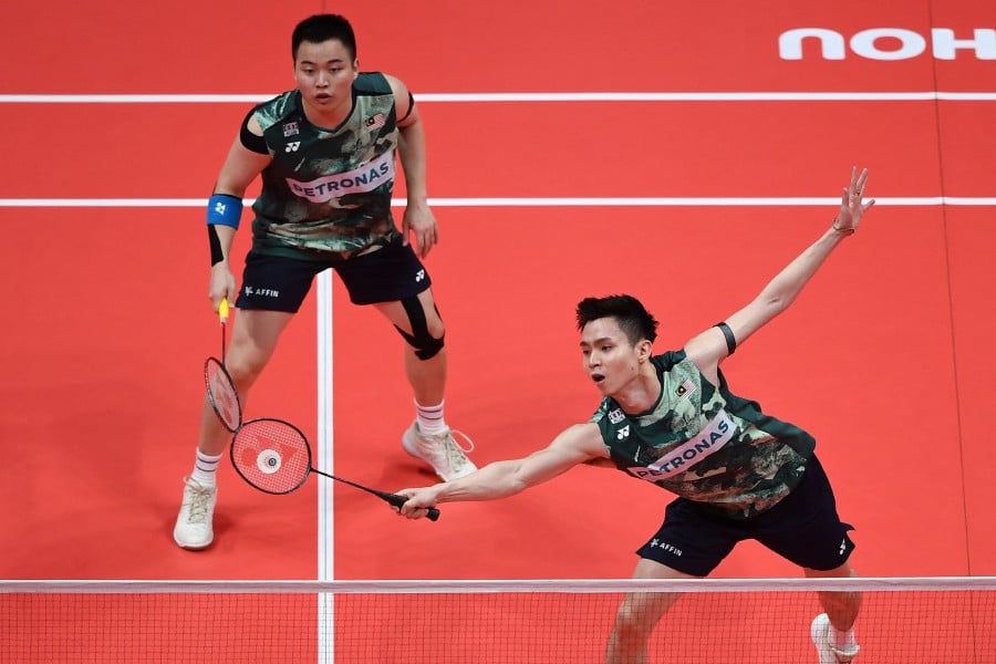 Malaysia’s Soh Wooi Yik and Aaron Chia at the BWF Badminton World Tour Finals in Hangzhou. -AFP/China OUT