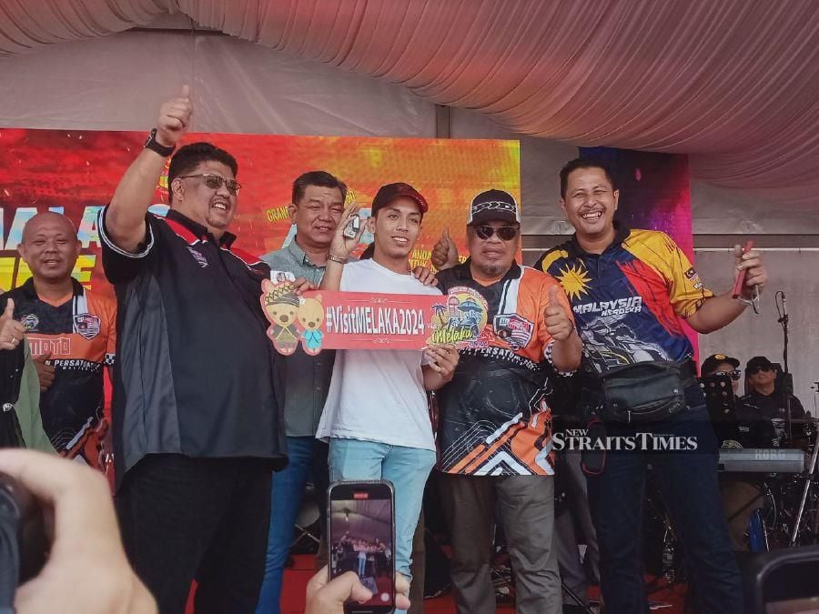 An 18-year-old boy went home with a brand-new Proton X50 sport utility vehicle (SUV) after emerging as the grand prize winner in a special edition lucky draw at the Malaysia Bike Week Melaka 2024 event. -NSTP/AMIR MAMAT