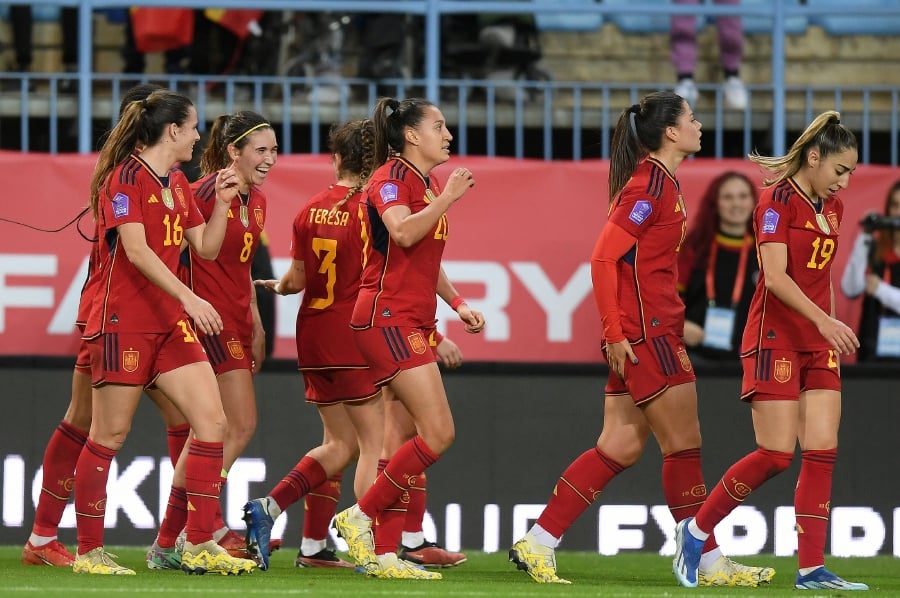 (FILE PHOTO) Spain's forward #20 Fiamma Benitez celebrates with teammates after scoring a goal during the UEFA Women's Nations League group A4 match. Spain have moved to the top of the FIFA ranking for the first time, displacing Sweden from the number one spot. -AFP/JORGE GUERRERO