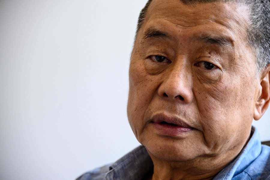 (FILE PHOTO) In this photo taken on June 16, 2020, Hong kong pro-democracy media mogul Jimmy Lai, 72, poses during an interview with AFP at the Next Digital offices in Hong Kong. Jailed pro-democracy media tycoon Jimmy Lai will go on trial for national security crimes in Hong Kong on December 18, 2023 having already spent three years behind bars and facing life in prison for widely condemned charges. -AFP/Anthony WALLACE
