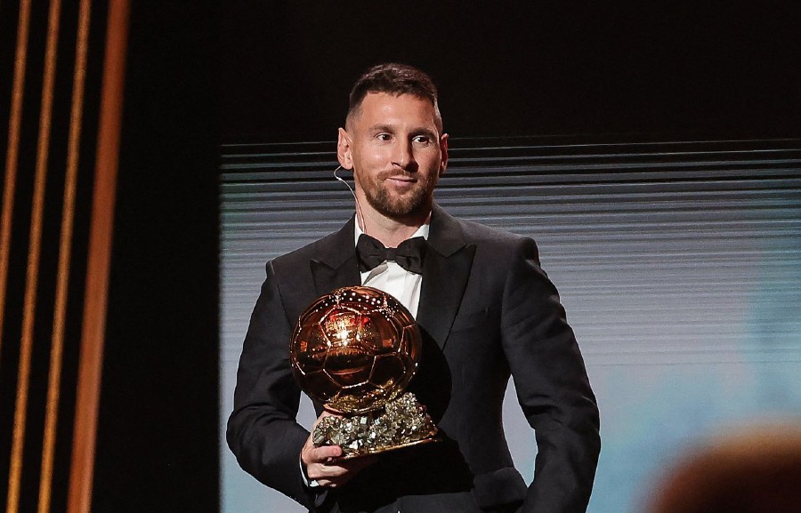 (FILE PHOTO) Inter Miami CF's Argentine forward Lionel Messi holds his trophy on stage as he receives his 8th Ballon d'Or award during the 2023 Ballon d'Or France Football award ceremony at the Theatre du Chatelet in Paris. -AFP/FRANCK FIFE
