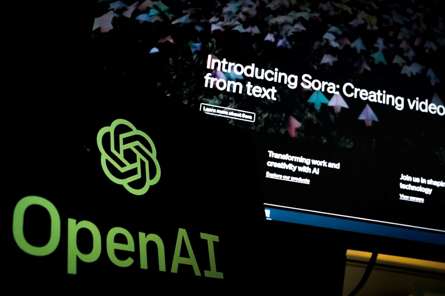 In this photo illustration, Open AI's newly released text-to-video "Sora" tool is advertised on their website on a monitor in Washington, DC, on February 16, 2024. OpenAI, the creator of ChatGPT and image generator DALL-E, said it was testing "Sora", which would allow users to create realistic videos with a simple prompt. The Microsoft-backed company said the new platform was currently being tested but released a few videos of what it said was already possible, with the accompanying input made to generate the video. -AFP/Drew Angerer