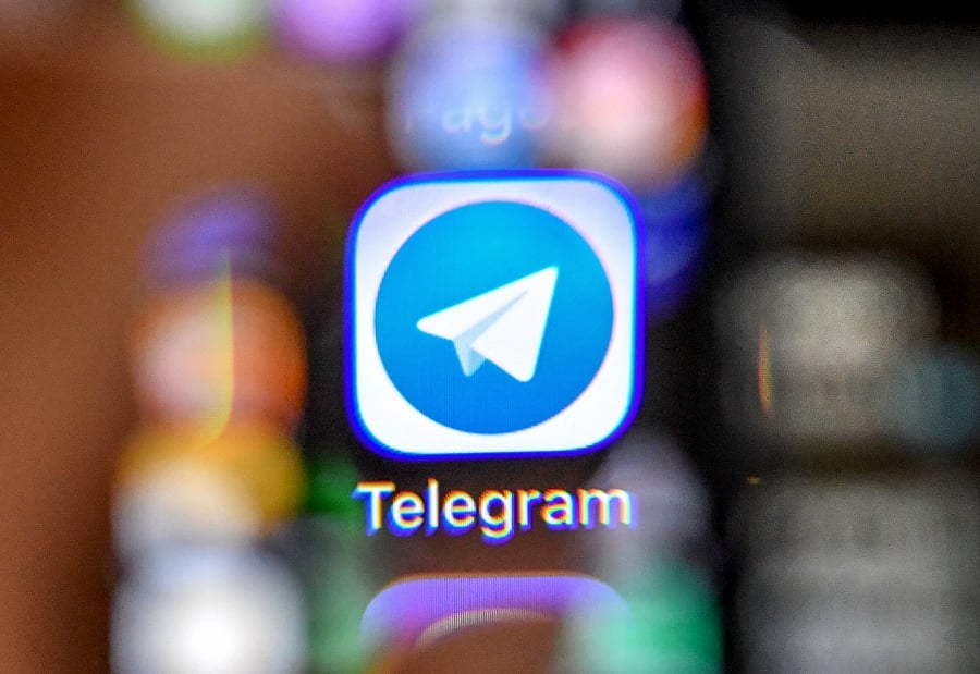 An illustration picture shows the icon of the popular messaging app Telegram on a smart phone screen. -AFP/Yuri KADOBNOV