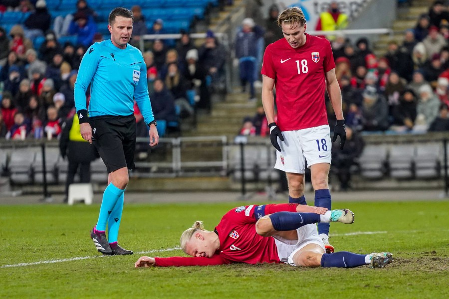 Norway's forward #09 Erling Haaland lies on the pitch during the football friendly match between Norway and Faroe Islands in Oslo, Norway, on November 16, 2023. -AFP/Lise Åserud