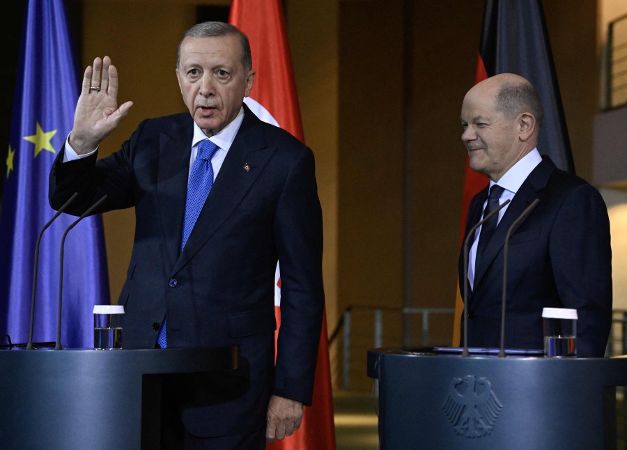 Turkish President Recep Tayyip Erdogan (left) addressing a joint press conference with German Chancellor Olaf Scholz before talks at the Chancellery in Berlin. -AFP/Tobias SCHWARZ