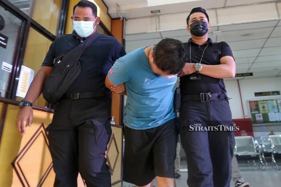 A lorry driver was charged with two counts of raping his stepdaughter in 2018 and 2019. -NSTP/DANIAL SAAD