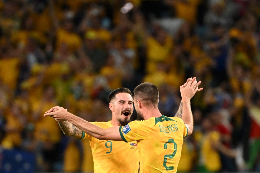 (FILE PHOTO) Australia's forward #09 Jamie Maclaren (left) and Australia's defender #02 Milos Degenek celebrate. -AFP/NATALIA KOLESNIKOVA