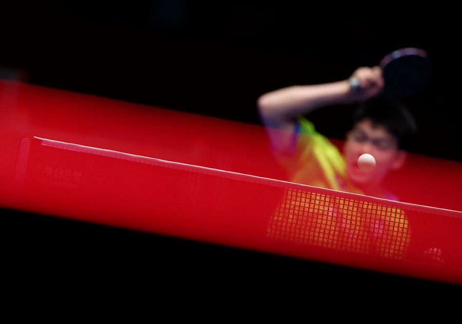 Taiwan's Kao Cheng-Jui in action during his men's singles group stage match at the ITTF World Team Table Tennis Championships Finals Busan 2024. -REUTERS/Kim Hong-Ji