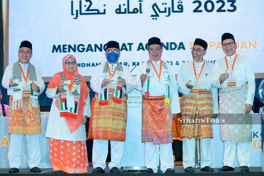 Amanah president Datuk Seri Mohamad Sabu (fourth from left) at the 2023 National Amanah Convention. -NSTP/ASYRAF HAMZAH