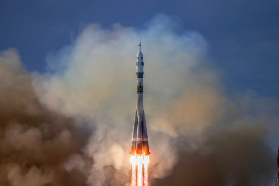 In this handout photograph taken and released by Russia's Roscosmos space agency on March 23, 2024, the Soyuz MS-25 spacecraft, carrying the International Space Station (ISS) Expedition 71 crew of NASA astronaut Tracy Dyson, Roscosmos cosmonaut Oleg Novitskiy and Belavia flight attendant and spaceflight participant Belarussian Marina Vasilevskaya, blasts off to the ISS from the Moscow-leased Baikonur cosmodrome in Kazakhstan. -AFP/HO/ROSCOSMOS