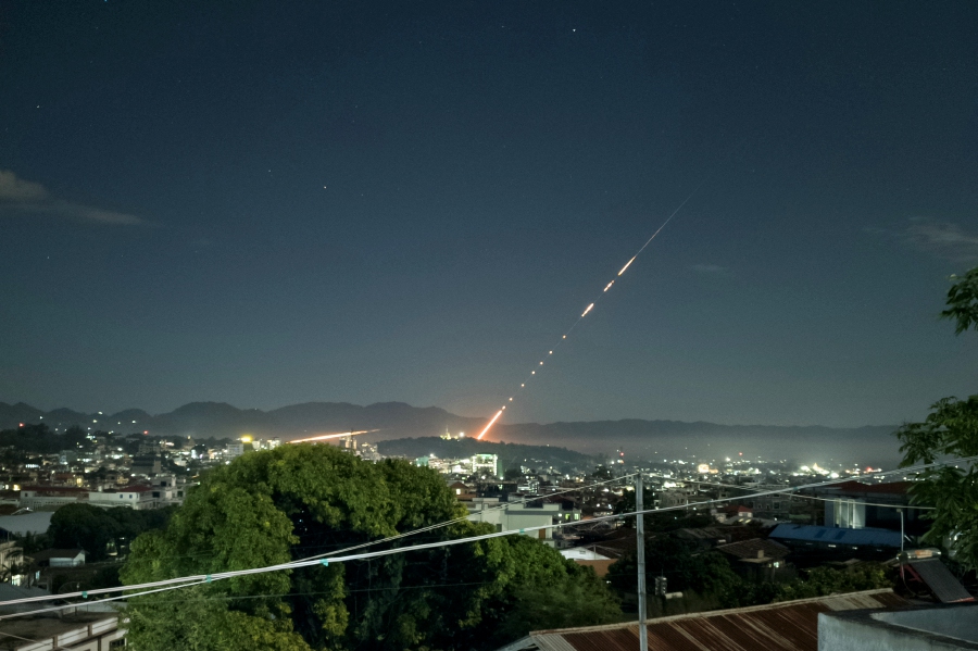 This long exposure picture taken late on October 28, 2023 shows a missile fired from a Myanmar military base in Lashio township, northern Shan State. Heavy fighting between rebels and the Myanmar military stretched into a second day near the country's northern border with China, armed groups said on October 28, 2023. -AFP PIC