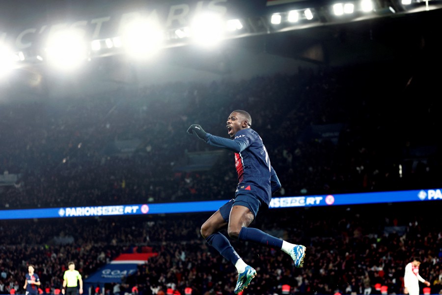 Paris St Germain's Ousmane Dembele celebrates scoring their third goal. -REUTERS/Gonzalo Fuentes
