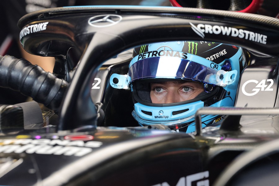 Mercedes' British driver George Russell sits in his car during the third practice session for the Abu Dhabi Formula One Grand Prix at the Yas Marina Circuit in the Emirati city on November 25, 2023. -AFP/Giuseppe CACACE