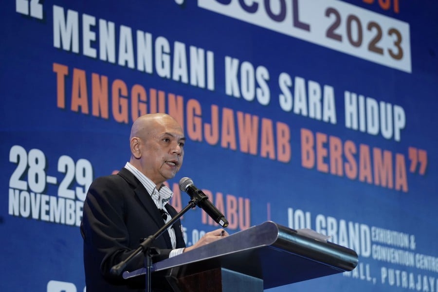 Acting Domestic Trade and Cost of Living minister Datuk Armizan Mohd Ali speaks at the launch of the Symposium on Cost of Living (SCOL 2023). -BERNAMA PIC