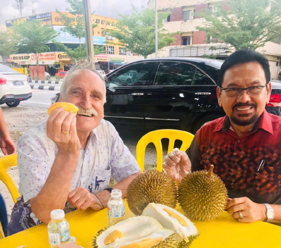 The writer enjoying durian with Wanrazuhar.