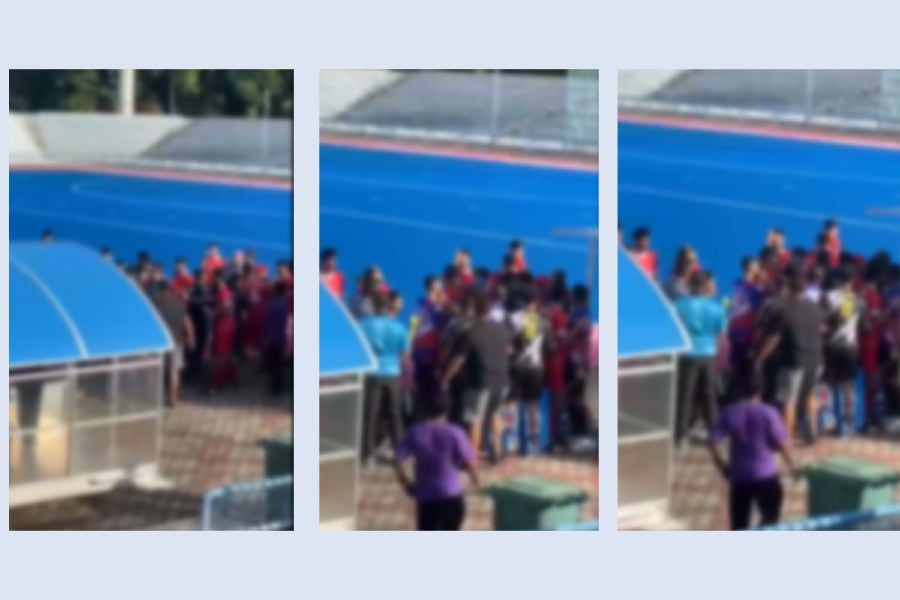 The image shows a screenshot of a viral video, depicting players and officials from opposing teams confronting each other during the opening men’s match of the Gurdwara Cup.