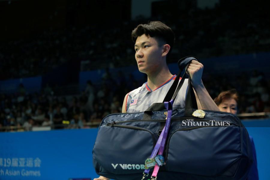 Lee Zii Jia competes in the men's singles event at the Hangzhou Asian Games. -NSTP/ASYRAF HAMZAH