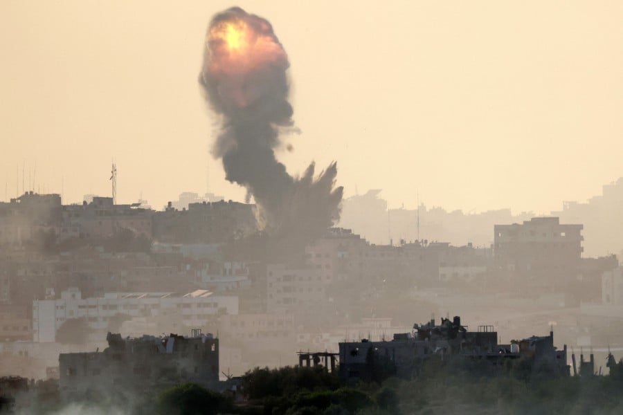Smoke billowing during Israeli bombardment in the north of the Gaza Strip. -AFP/Menahem KAHANA