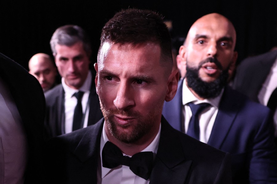 Inter Miami CF's Argentine forward Lionel Messi (centre) reacts as he leaves the 2023 Ballon d'Or France Football award ceremony at the Theatre du Chatelet in Paris. Lionel Messi won the men's Ballon d'Or award for a record-extending eight time. -AFP/FRANCK FIFE