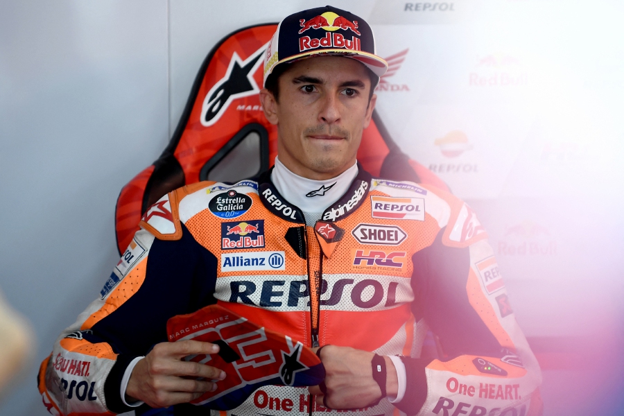 (FILE PHOTO) Repsol Honda Team rider Marc Marquez of Spain prepares for the MotoGP class free practice session of the Japanese Grand Prix. Marquez will leave Honda at the end of the 2023 season after both sides agreed to terminate their four-year contract a year early. -AFP/Toshifumi KITAMURA