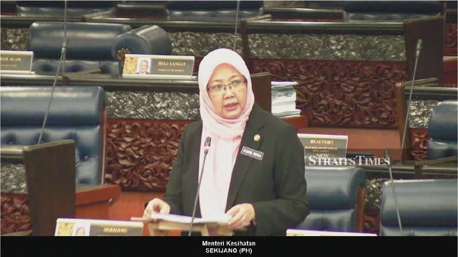 Health Minister Dr Zaliha Mustafa tabling the Health White Paper during the Dewan Rakyat sitting today.