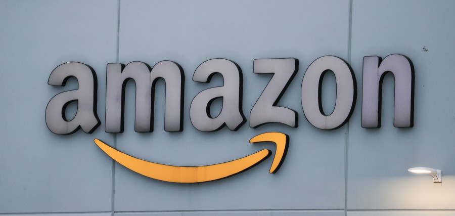 An Amazon warehouse is outfitted with the Amazon logo in Waukegan, Illinois, USA. -- EPA
