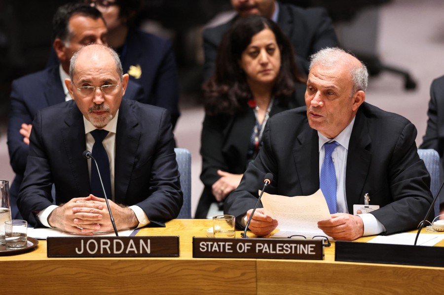 Ziad Abu Amr (R), Special Representative of the Palestinian president, speaks flanked by Jordanian Deputy Prime Minister and Minister of Foreign Affairs Ayman Safadi during a United Nations Security Council meeting at UN headquarters in New York. - AFP PIC