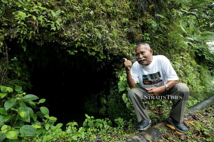 Pak Tam sharing tales about one of three tunnels of Kolong Pahat.