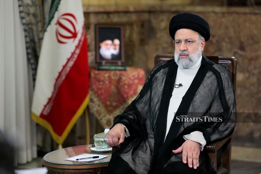 FILE PHOTO: Iranian President Ebrahim Raisi looks on during a TV interview, in Tehran, Iran May 7, 2024. -- Iran's Presidency/WANA (West Asia News Agency)/Handout via REUTERS 
