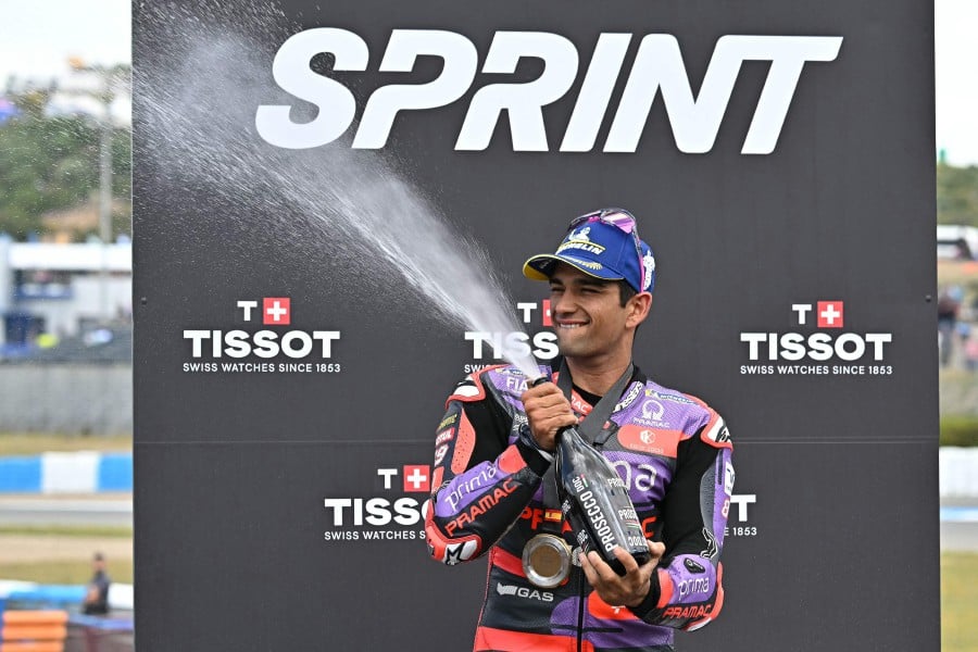 Ducati Spanish rider Jorge Martin celebrates after winning the Sprint race of the MotoGP Spanish Grand Prix at the Jerez racetrack in Jerez de la Frontera on April 27, 2024. -- AFP
